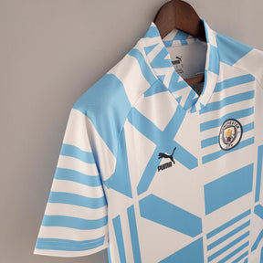 Camisa Manchester City 22/23 – Pré-Jogo Azul e Branco